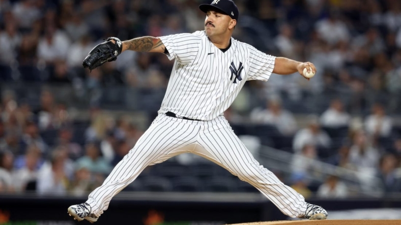 Sep 20, 2022; Bronx, New York, USA; New York Yankees starting pitcher Nestor Cortes (65) pitches against the Pittsburgh Pirates during the first inning at Yankee Stadium. Mandatory Credit: Brad Penner-USA TODAY Sports
