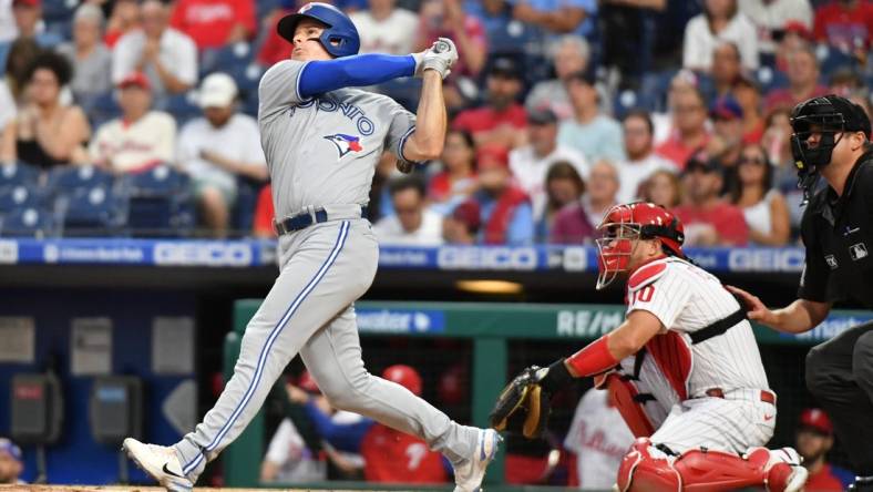 Sep 20, 2022; Philadelphia, Pennsylvania, USA; Toronto Blue Jays third baseman Matt Chapman (26) watches his three run home run against the Philadelphia Phillies during the first inning at Citizens Bank Park. Mandatory Credit: Eric Hartline-USA TODAY Sports