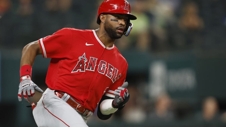 Sep 20, 2022; Arlington, Texas, USA; Los Angeles Angels left fielder Jo Adell (7) runs to second base with a double in the third inning against the Texas Rangers at Globe Life Field. Mandatory Credit: Tim Heitman-USA TODAY Sports