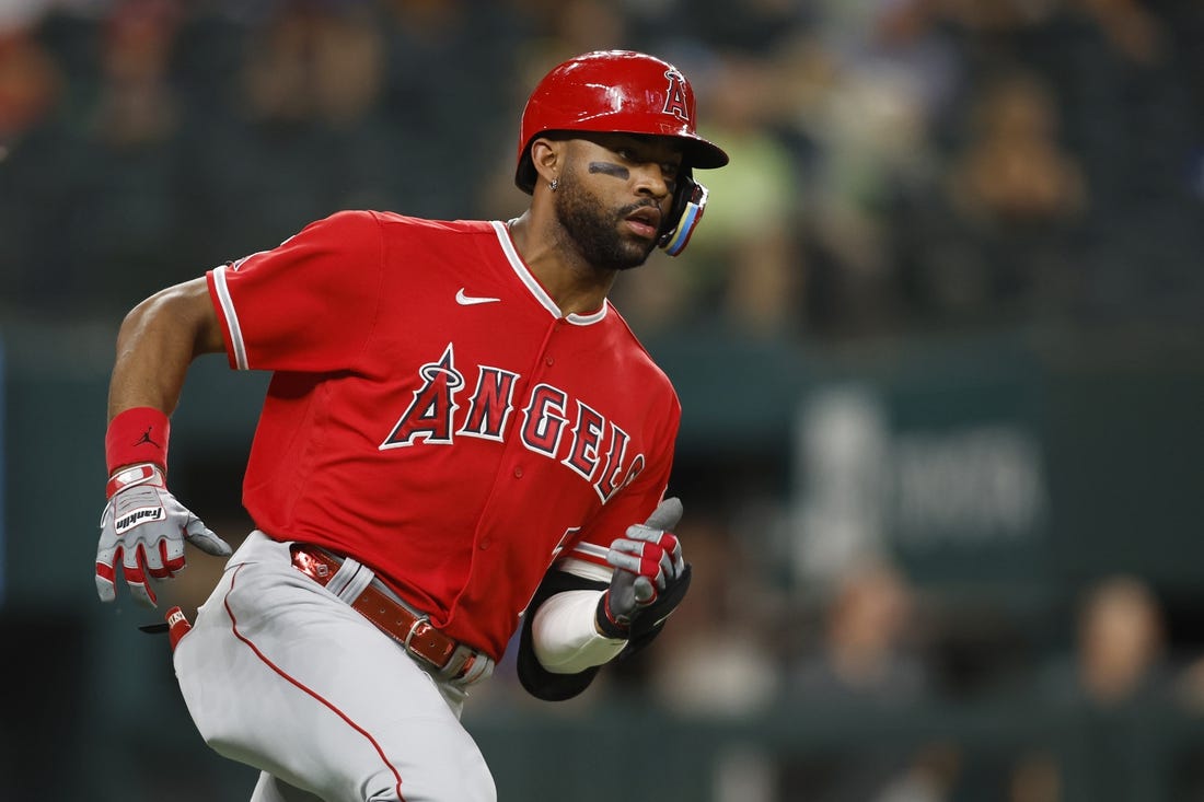 Sep 20, 2022; Arlington, Texas, USA; Los Angeles Angels left fielder Jo Adell (7) runs to second base with a double in the third inning against the Texas Rangers at Globe Life Field. Mandatory Credit: Tim Heitman-USA TODAY Sports