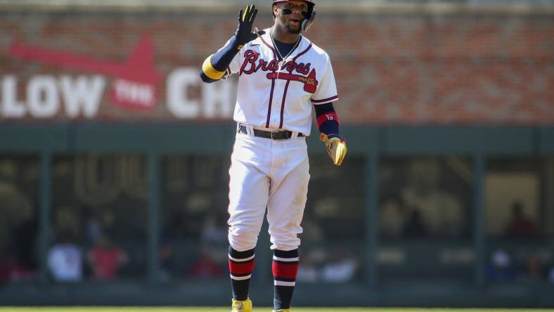 Sep 21, 2022; Atlanta, Georgia, USA; Atlanta Braves right fielder Ronald Acuna Jr. (13) on second base against the Washington Nationals in the first inning at Truist Park. Mandatory Credit: Brett Davis-USA TODAY Sports