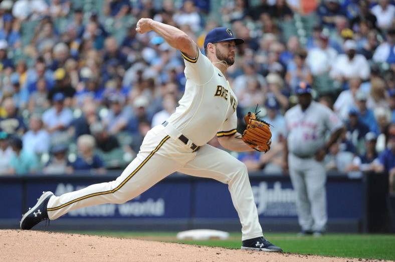 Sep 21, 2022; Milwaukee, Wisconsin, USA;  Milwaukee Brewers starting pitcher Adrian Houser (37) delivers a pitch against the New York Mets in the fourth inning at American Family Field. Mandatory Credit: Michael McLoone-USA TODAY Sports