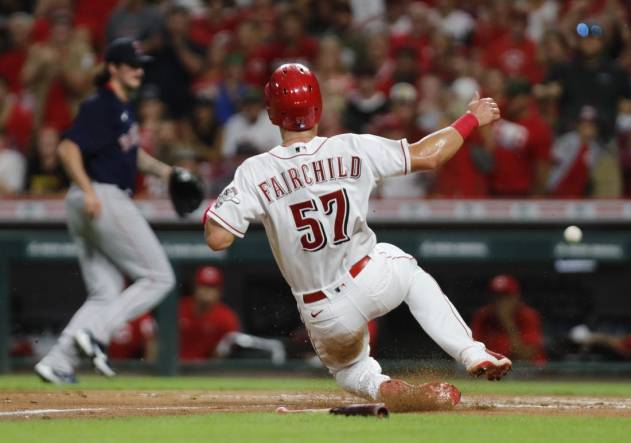 Cincinnati Reds left fielder Stuart Fairchild enters the field