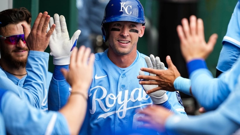 Sep 22, 2022; Kansas City, Missouri, USA; Kansas City Royals center fielder Drew Waters (6) is congratulated by teammates after hitting a home run during the fifth inning against the Minnesota Twins at Kauffman Stadium. Mandatory Credit: Jay Biggerstaff-USA TODAY Sports