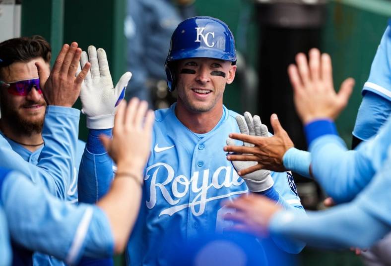 Sep 22, 2022; Kansas City, Missouri, USA; Kansas City Royals center fielder Drew Waters (6) is congratulated by teammates after hitting a home run during the fifth inning against the Minnesota Twins at Kauffman Stadium. Mandatory Credit: Jay Biggerstaff-USA TODAY Sports