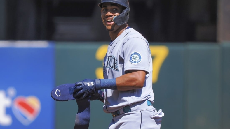 Sep 22, 2022; Oakland, California, USA; Seattle Mariners center fielder Julio Rodriguez (44) reacts after hitting a double against the Oakland Athletics during the first inning at RingCentral Coliseum. Mandatory Credit: Kelley L Cox-USA TODAY Sports