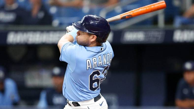 Sep 22, 2022; St. Petersburg, Florida, USA;  Tampa Bay Rays third baseman Jonathan Aranda (62) hits a home run against the Toronto Blue Jays  in the first inning at Tropicana Field. Mandatory Credit: Nathan Ray Seebeck-USA TODAY Sports