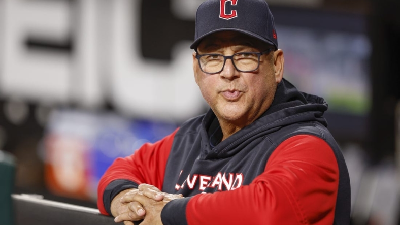 Sep 22, 2022; Chicago, Illinois, USA; Cleveland Guardians manager Terry Francona (77) looks on from the dugout before a baseball game against the Chicago White Sox at Guaranteed Rate Field. Mandatory Credit: Kamil Krzaczynski-USA TODAY Sports