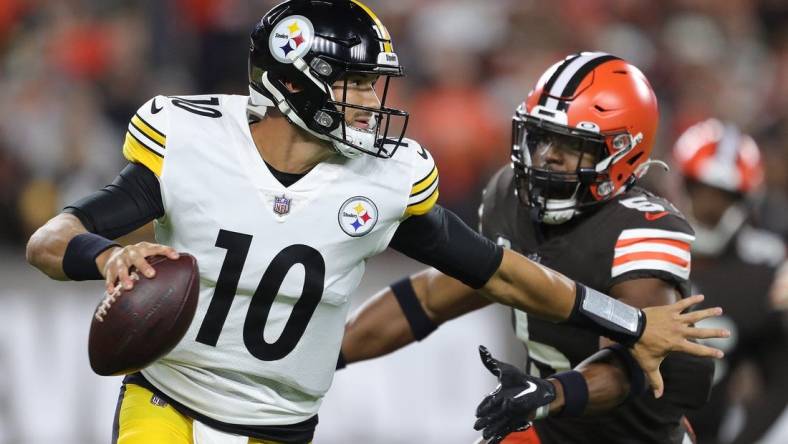 Steelers quarterback Mitch Trubisky is forced out of the pocket by Browns linebacker Anthony Walker Jr. during the first half Thursday, Sept. 22, 2022, in Cleveland.

Brownssteelers 2