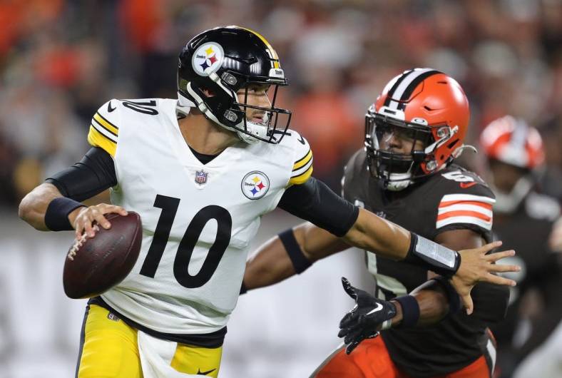 Steelers quarterback Mitch Trubisky is forced out of the pocket by Browns linebacker Anthony Walker Jr. during the first half Thursday, Sept. 22, 2022, in Cleveland.

Brownssteelers 2