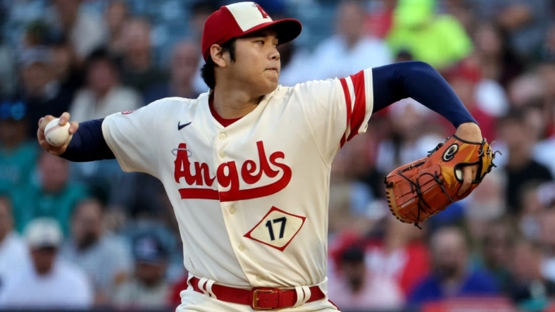 Sep 17, 2022; Anaheim, California, USA;  Los Angeles Angels two-way player Shohei Ohtani (17) pitches during the first inning against the Seattle Mariners at Angel Stadium. Mandatory Credit: Kiyoshi Mio-USA TODAY Sports
