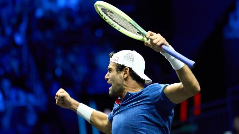 Sep 24, 2022; London, United Kingdom;
Matteo Berrettini (ITA) celebrates winning against Felix Auger-Aliassime (CAN) in a Laver Cup singles match.  Mandatory Credit: Peter van den Berg-USA TODAY Sports