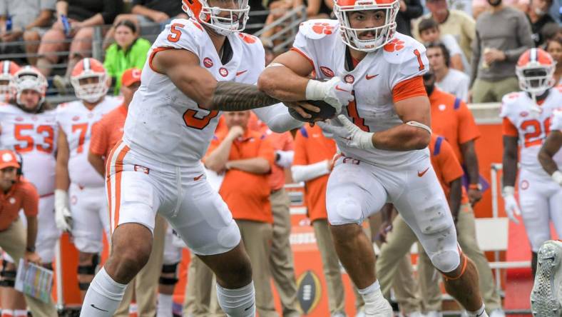 Clemson quarterback D.J. Uiagalelei (5) hands off to running back Will Shipley (1) during the third quarter at Truist Field in Winston-Salem, North Carolina Saturday, September 24, 2022.

Ncaa Football Clemson At Wake Forest