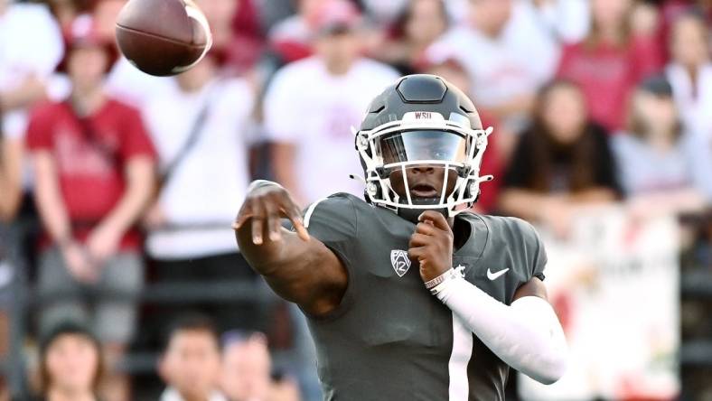 Sep 24, 2022; Pullman, Washington, USA; Washington State Cougars quarterback Cameron Ward (1) throws a pass against the Oregon Ducks in the second half at Gesa Field at Martin Stadium. Ducks won 44-41. Mandatory Credit: James Snook-USA TODAY Sports