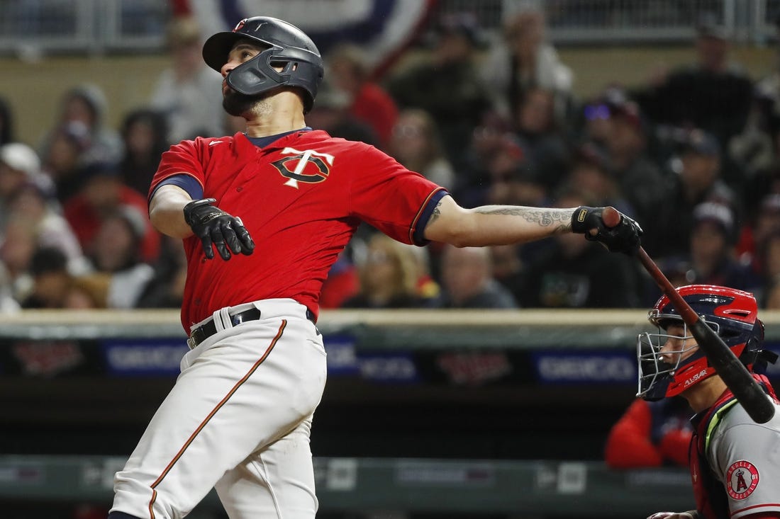 Sep 24, 2022; Minneapolis, Minnesota, USA; Minnesota Twins catcher Gary Sanchez (24) hits a three-run home run against the Los Angeles Angels in the fifth inning at Target Field. Mandatory Credit: Bruce Kluckhohn-USA TODAY Sports