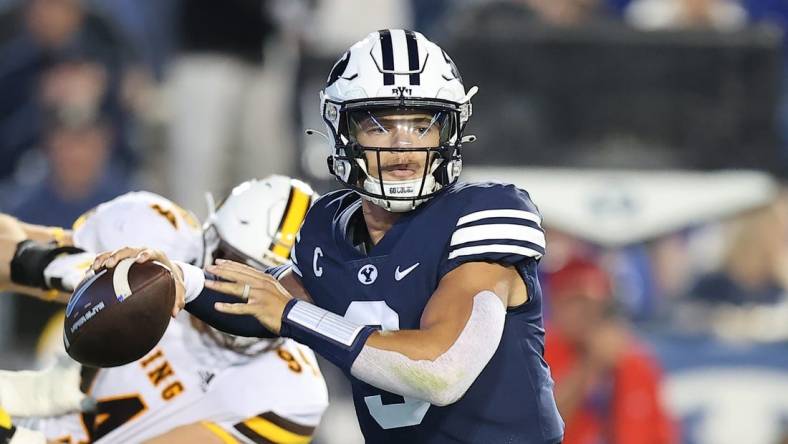 Sep 24, 2022; Provo, Utah, USA; Brigham Young Cougars quarterback Jaren Hall (3) throws the ball against the Wyoming Cowboys in the second quarter at LaVell Edwards Stadium. Mandatory Credit: Rob Gray-USA TODAY Sports