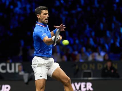 Sep 25, 2022; London, United Kingdom; Novak Djokovic (SRB) plays a shot against Felix Auger-Aliassime (CAN) in Laver Cup singles. Mandatory Credit: Peter van den Berg-USA TODAY Sports