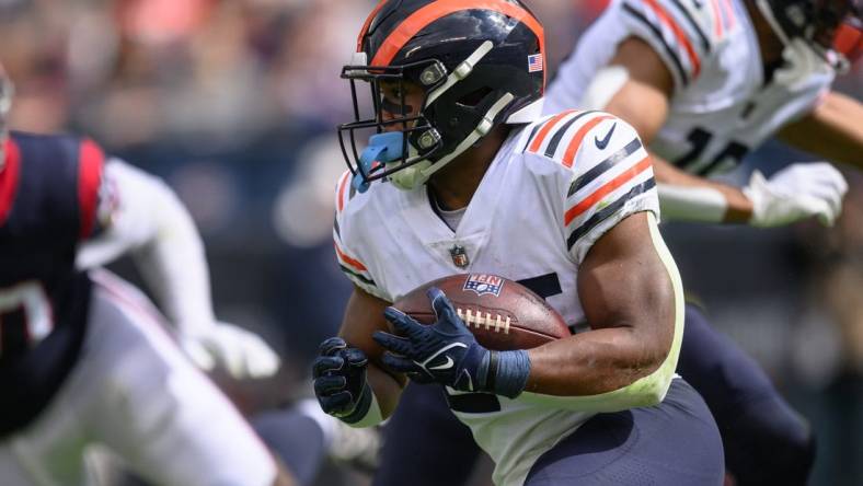 Sep 25, 2022; Chicago, Illinois, USA; Chicago Bears running back Khalil Herbert (24) runs the ball in the second quarter against the Houston Texans at Soldier Field. Mandatory Credit: Daniel Bartel-USA TODAY Sports