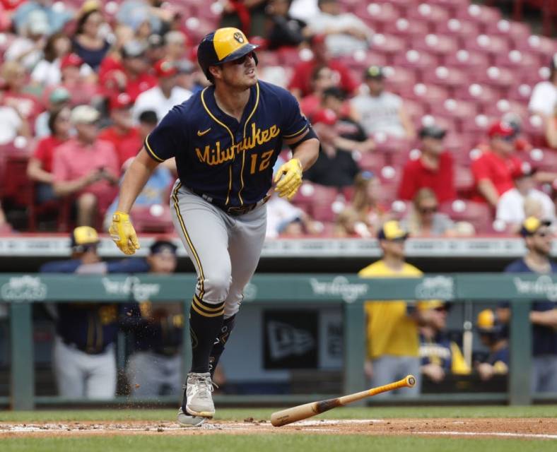 Sep 25, 2022; Cincinnati, Ohio, USA; Milwaukee Brewers right fielder Hunter Renfroe (12) runs after hitting a solo home run against the Cincinnati Reds during the first inning at Great American Ball Park. Mandatory Credit: David Kohl-USA TODAY Sports