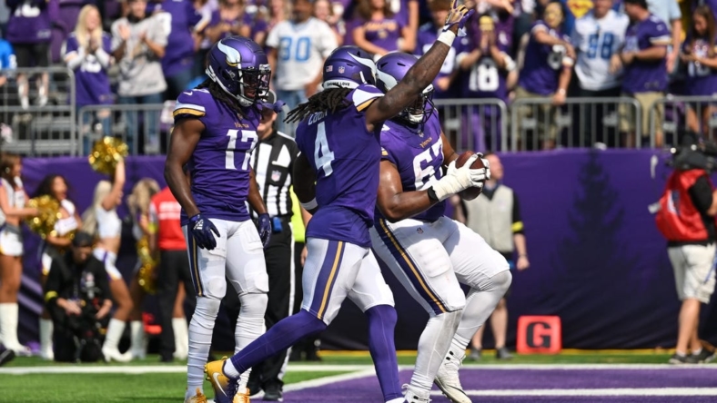 Sep 25, 2022; Minneapolis, Minnesota, USA; Minnesota Vikings running back Dalvin Cook (4) and wide receiver K.J. Osborn (17) and guard Ed Ingram (67) react after a touchdown against the Detroit Lions during the second quarter at U.S. Bank Stadium. Mandatory Credit: Jeffrey Becker-USA TODAY Sports