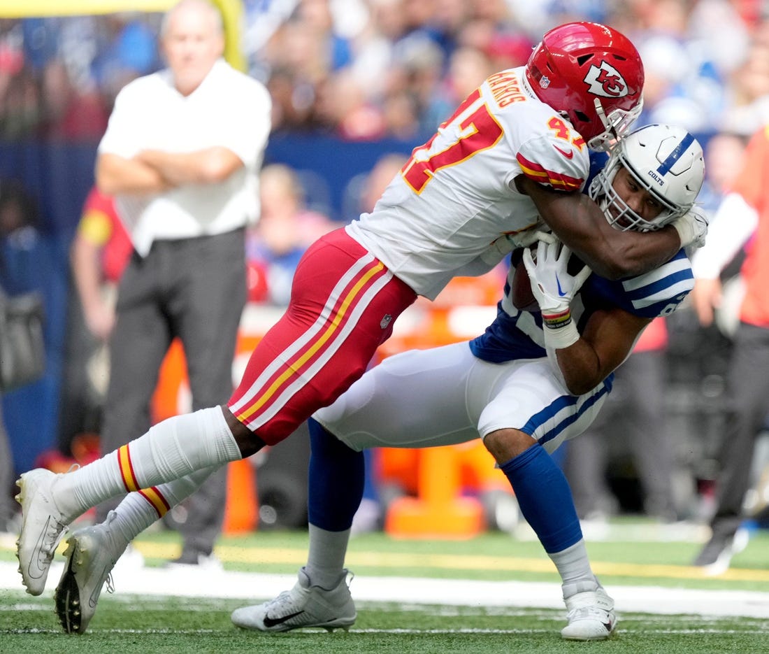 Kansas City Chiefs linebacker Darius Harris (47) tackles Indianapolis Colts tight end Kylen Granson (83) Sunday, Sept. 25, 2022, during a game against the Kansas City Chiefs at Lucas Oil Stadium in Indianapolis.