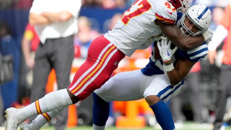 Kansas City Chiefs linebacker Darius Harris (47) tackles Indianapolis Colts tight end Kylen Granson (83) Sunday, Sept. 25, 2022, during a game against the Kansas City Chiefs at Lucas Oil Stadium in Indianapolis.