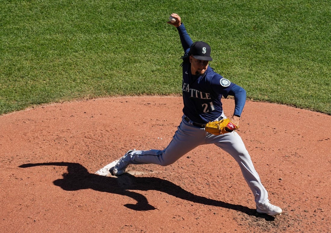 Sep 25, 2022; Kansas City, Missouri, USA; Seattle Mariners starting pitcher Luis Castillo (21) pitches against the Kansas City Royals during the third inning against the Kansas City Royals at Kauffman Stadium. Mandatory Credit: Jay Biggerstaff-USA TODAY Sports