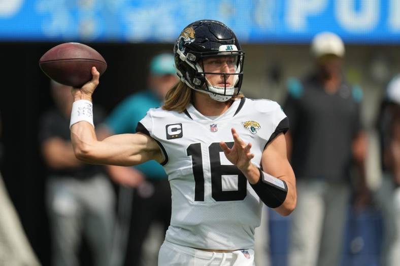 Sep 25, 2022; Inglewood, California, USA; Jacksonville Jaguars quarterback Trevor Lawrence (16) throws the ball against the Los Angeles Chargers in the first half at SoFi Stadium. Mandatory Credit: Kirby Lee-USA TODAY Sports