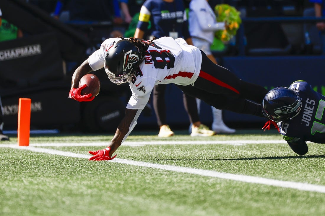 Sep 25, 2022; Seattle, Washington, USA; Atlanta Falcons running back Cordarrelle Patterson (84) rushes for a touchdown against the Seattle Seahawks during the second quarter at Lumen Field. Mandatory Credit: Joe Nicholson-USA TODAY Sports