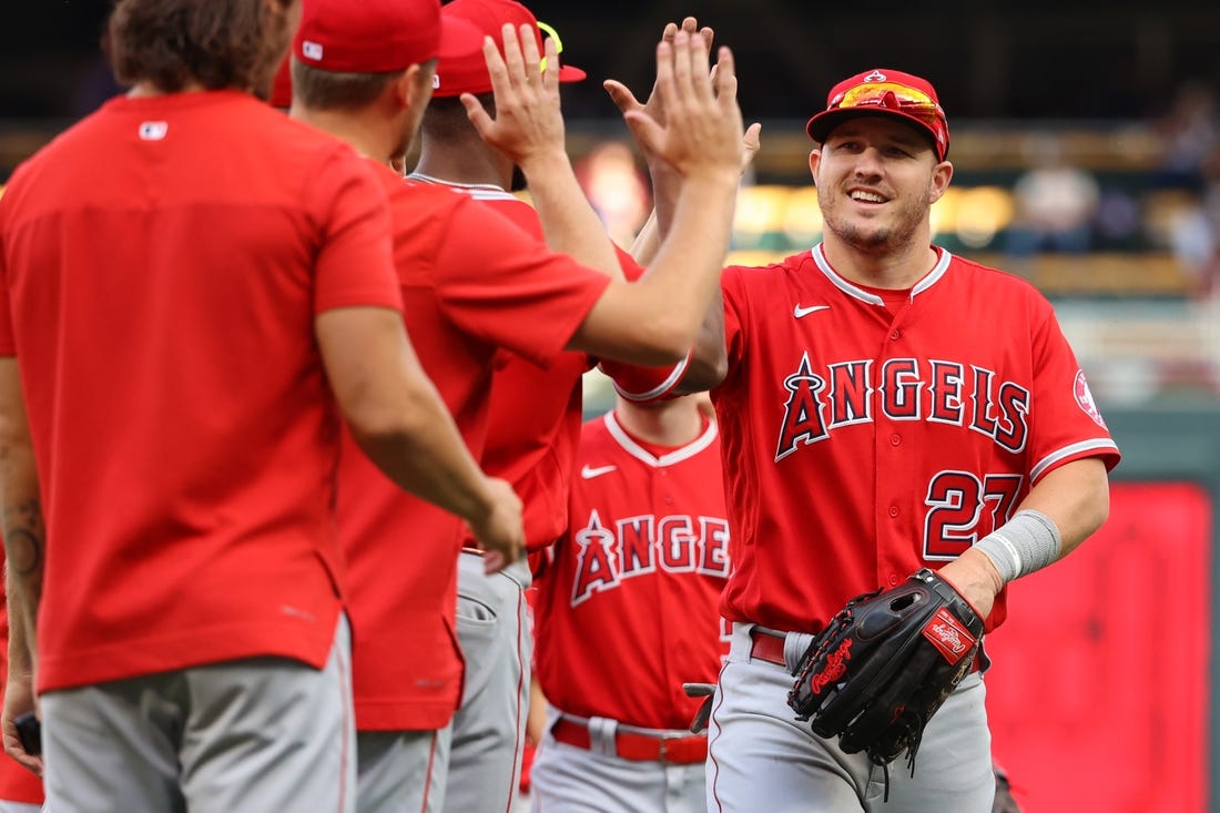 Sep 25, 2022; Minneapolis, Minnesota, USA; Los Angeles Angels center fielder Mike Trout (27) celebrates the win against the Minnesota Twins at Target Field. Mandatory Credit: Matt Krohn-USA TODAY Sports