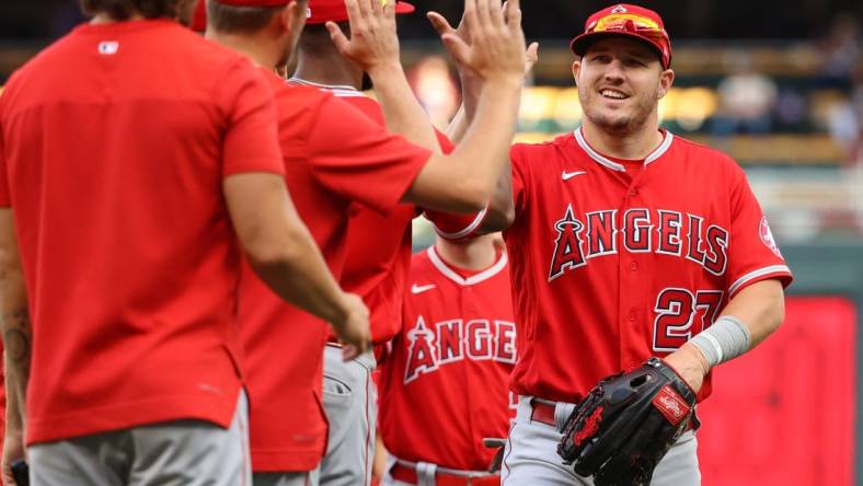 Sep 25, 2022; Minneapolis, Minnesota, USA; Los Angeles Angels center fielder Mike Trout (27) celebrates the win against the Minnesota Twins at Target Field. Mandatory Credit: Matt Krohn-USA TODAY Sports