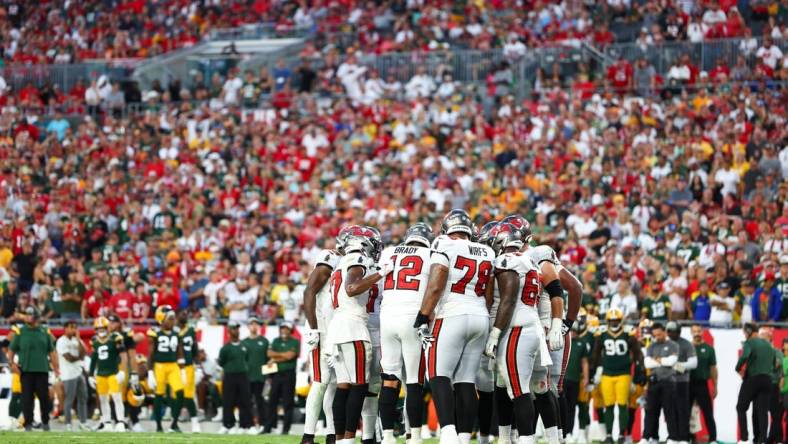 Sep 25, 2022; Tampa, Florida, USA;  the Tampa Bay Buccaneers huddle against the Green Bay Packers in the fourth quarter at Raymond James Stadium. Mandatory Credit: Nathan Ray Seebeck-USA TODAY Sports