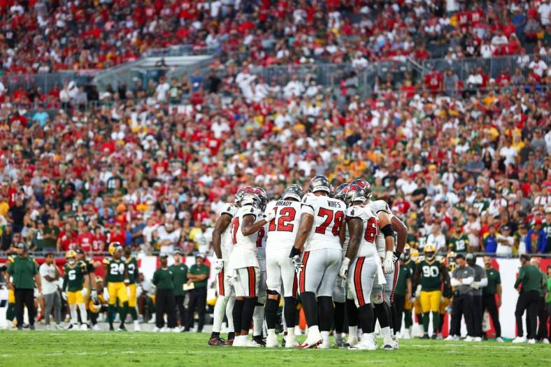 Sep 25, 2022; Tampa, Florida, USA;  the Tampa Bay Buccaneers huddle against the Green Bay Packers in the fourth quarter at Raymond James Stadium. Mandatory Credit: Nathan Ray Seebeck-USA TODAY Sports