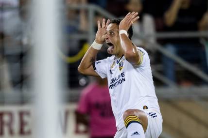 Sep 24, 2022; Stanford, California, USA; Los Angeles Galaxy forward Javier Hernandez (14) celebrates after scoring against the San Jose Earthquakes during the second half at Stanford Stadium. Mandatory Credit: John Hefti-USA TODAY Sports