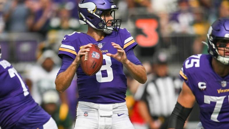 Sep 11, 2022; Minneapolis, Minnesota, USA; Minnesota Vikings quarterback Kirk Cousins (8) in action against the Green Bay Packers at U.S. Bank Stadium. Mandatory Credit: Jeffrey Becker-USA TODAY Sports