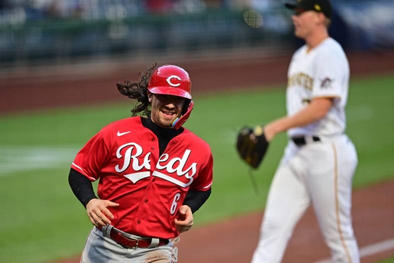 Sep 27, 2022; Pittsburgh, Pennsylvania, USA; Cincinnati Reds second baseman Jonathan India (6) scores a run after a wild pitch by Pittsburgh Pirates starting pitcher Mitch Keller (23) during the first inning at PNC Park. Mandatory Credit: David Dermer-USA TODAY Sports