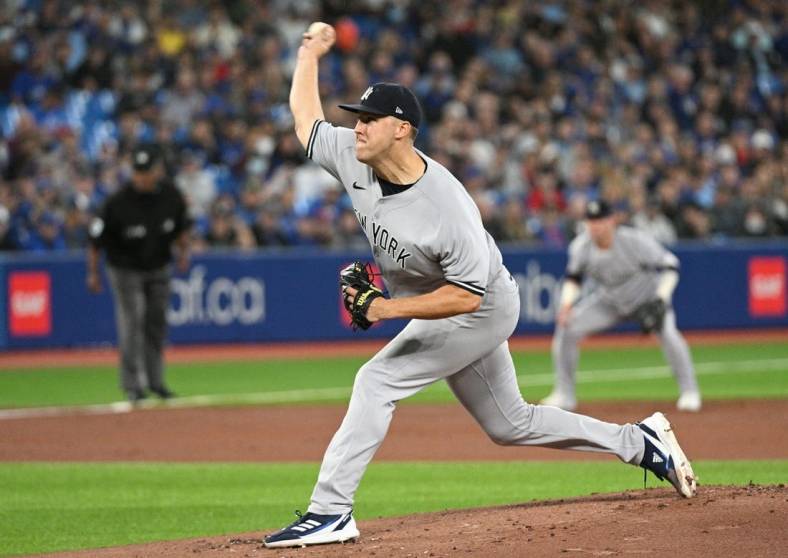 Sep 27, 2022; Toronto, Ontario, CAN;  New York Yankees starting pitcher Jameson Taillon (50) delivers a pitch against the Toronto Blue Jays in the first inning at Rogers Centre. Mandatory Credit: Dan Hamilton-USA TODAY Sports