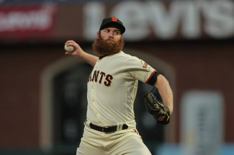Sep 28, 2022; San Francisco, California, USA; San Francisco Giants starting pitcher John Brebbia (59) throws a pitch during the first inning against the Colorado Rockies at Oracle Park. Mandatory Credit: Sergio Estrada-USA TODAY Sports