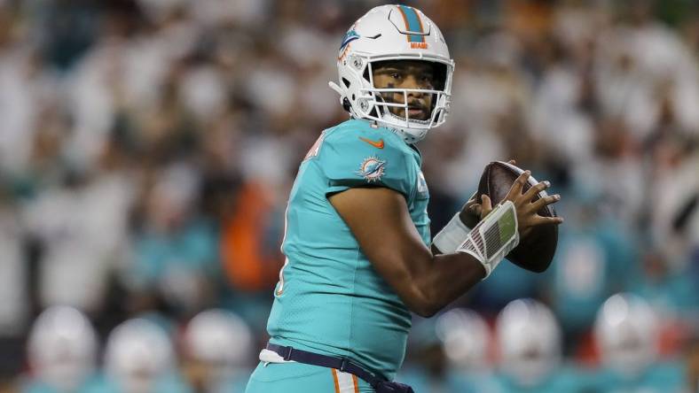 Sep 29, 2022; Cincinnati, Ohio, USA; Miami Dolphins quarterback Tua Tagovailoa (1) throws a pass against the Cincinnati Bengals in the first half at Paycor Stadium. Mandatory Credit: Katie Stratman-USA TODAY Sports