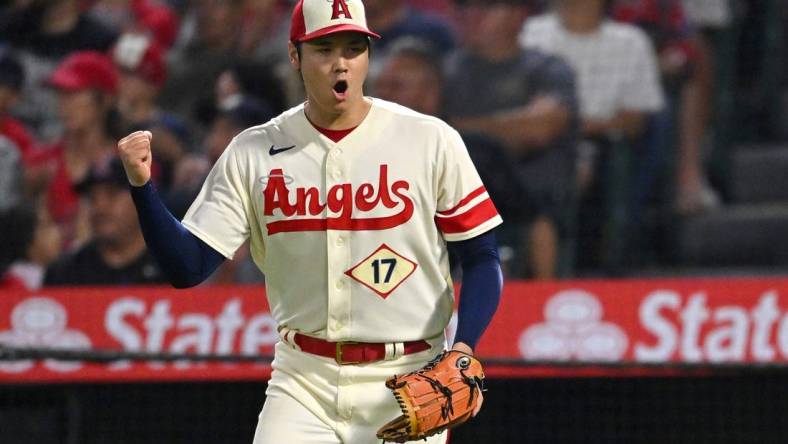 Sep 29, 2022; Anaheim, California, USA; Los Angeles Angels starting pitcher Shohei Ohtani (17) reacts after making a play for the final out of the sixth inning against the Oakland Athletics at Angel Stadium. Mandatory Credit: Jayne Kamin-Oncea-USA TODAY Sports