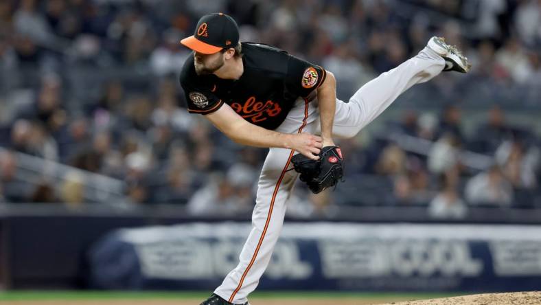 Sep 30, 2022; Bronx, New York, USA; Baltimore Orioles starting pitcher Jordan Lyles (28) follows through on a pitch against the New York Yankees during the first inning at Yankee Stadium. Mandatory Credit: Brad Penner-USA TODAY Sports