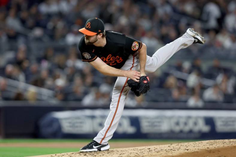 Sep 30, 2022; Bronx, New York, USA; Baltimore Orioles starting pitcher Jordan Lyles (28) follows through on a pitch against the New York Yankees during the first inning at Yankee Stadium. Mandatory Credit: Brad Penner-USA TODAY Sports