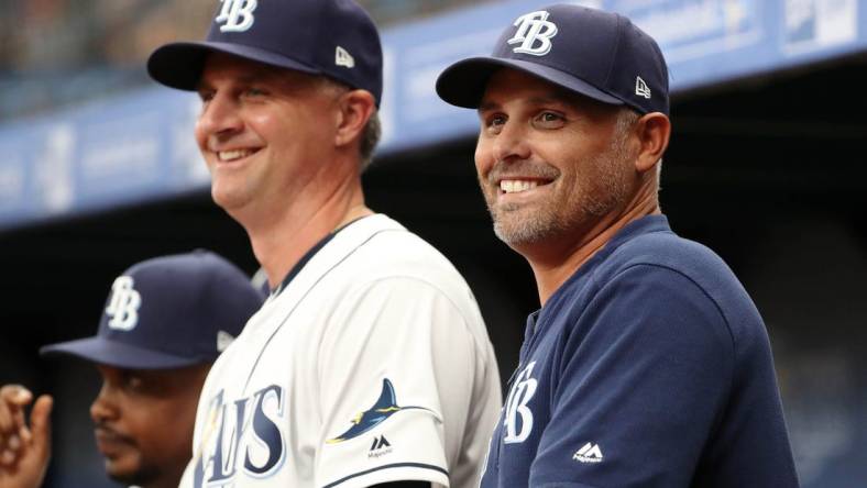 Mar 28, 2019; St. Petersburg, FL, USA; Tampa Bay Rays manager Kevin Cash (16) and bench coach Matt Quatraro (33) during the first inning against the Houston Astros at Tropicana Field. Mandatory Credit: Kim Klement-USA TODAY Sports