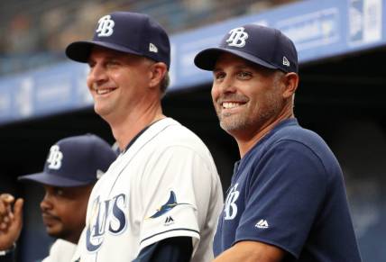 Mar 28, 2019; St. Petersburg, FL, USA; Tampa Bay Rays manager Kevin Cash (16) and bench coach Matt Quatraro (33) during the first inning against the Houston Astros at Tropicana Field. Mandatory Credit: Kim Klement-USA TODAY Sports