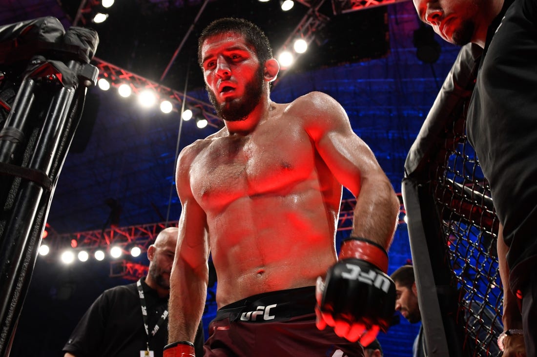 Sep 7, 2019; Abu Dhabi, UAE; Islam Makhachev (red gloves) against Davi Ramos (not pictured) during UFC 242 at The Arena. Mandatory Credit: Per Haljestam-USA TODAY Sports