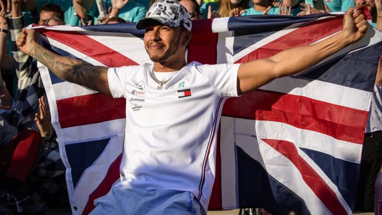 Nov 3, 2019; Austin, TX, USA; Mercedes AMG Petronas Motorsport driver Lewis Hamilton (44) of Great Britain celebrates winning his sixth world championship after the United States Grand Prix at Circuit of the Americas. Mandatory Credit: Jerome Miron-USA TODAY Sports