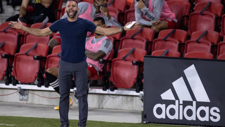 Sep 27, 2020; Washington, D.C., USA; D.C. United head coach Ben Olsen reacts to a play during the first half of the game against the New England Revolution at Audi Field. Mandatory Credit: Scott Taetsch-USA TODAY Sports