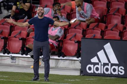 Sep 27, 2020; Washington, D.C., USA; D.C. United head coach Ben Olsen reacts to a play during the first half of the game against the New England Revolution at Audi Field. Mandatory Credit: Scott Taetsch-USA TODAY Sports