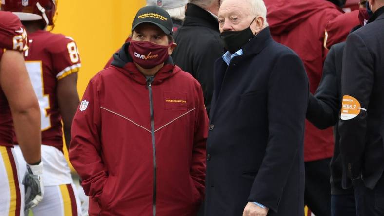 Oct 25, 2020; Landover, Maryland, USA; Washington Football Team owner Dan Snyder (L) talks with Dallas Cowboys owner Jerry Jones (R) on the field during warm ups prior to their game at FedExField. Mandatory Credit: Geoff Burke-USA TODAY Sports