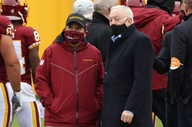 Oct 25, 2020; Landover, Maryland, USA; Washington Football Team owner Dan Snyder (L) talks with Dallas Cowboys owner Jerry Jones (R) on the field during warm ups prior to their game at FedExField. Mandatory Credit: Geoff Burke-USA TODAY Sports